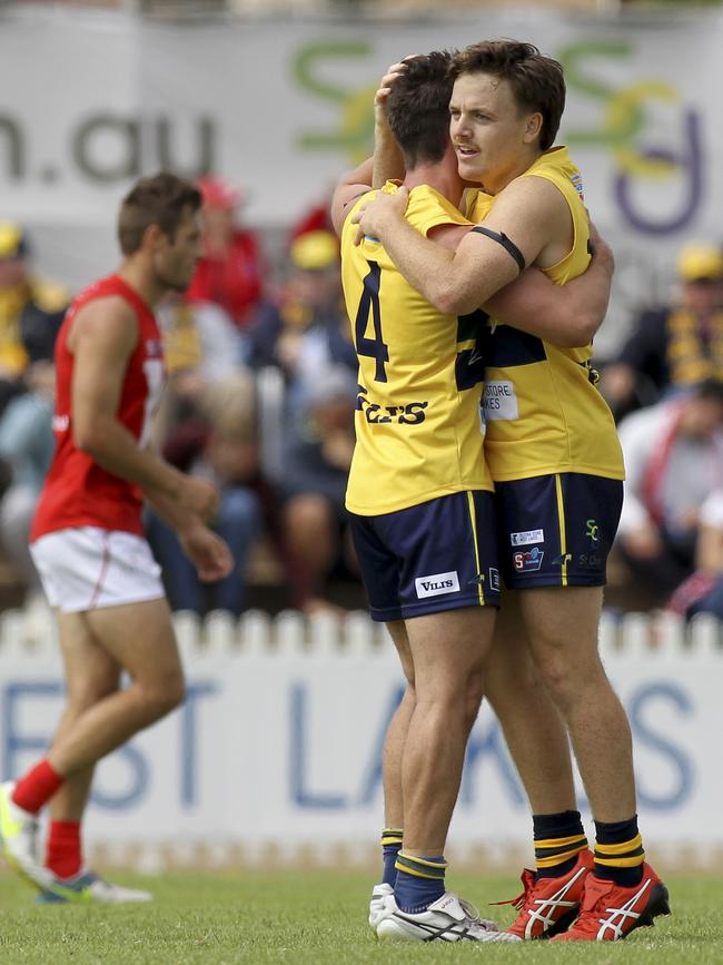 Eagles Jake Johansen and James Rowe celebrate a goal. Picture: AAP Image/Dean Martin