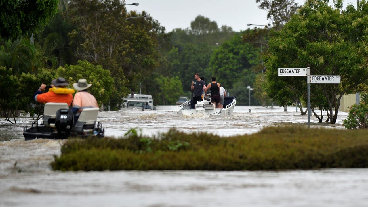 Locals with boats helping evacuate residents of Idalia trapped in waters. Picture: Alix Sweeney