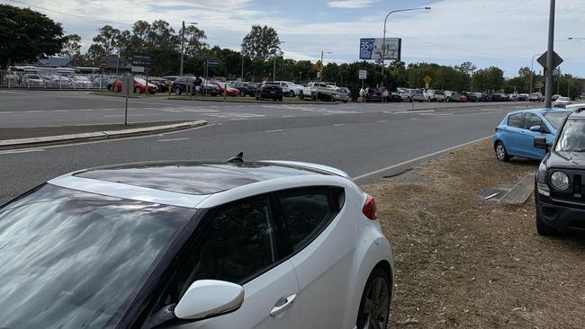 Cars parked on the verge along Beams Rd, Carseldine near the train station. Picture: David Willoughby