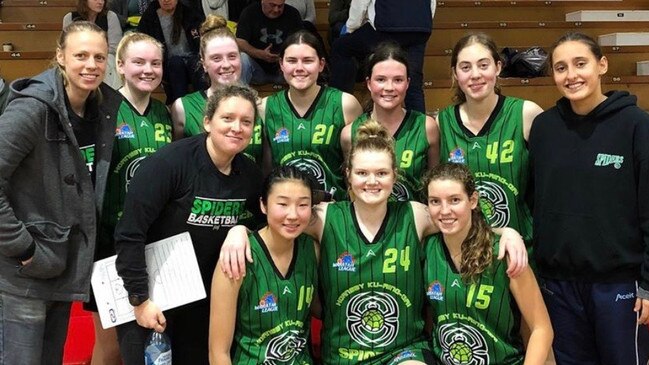 Sarah Graham and basketballers from her Hornsby under 18s team.