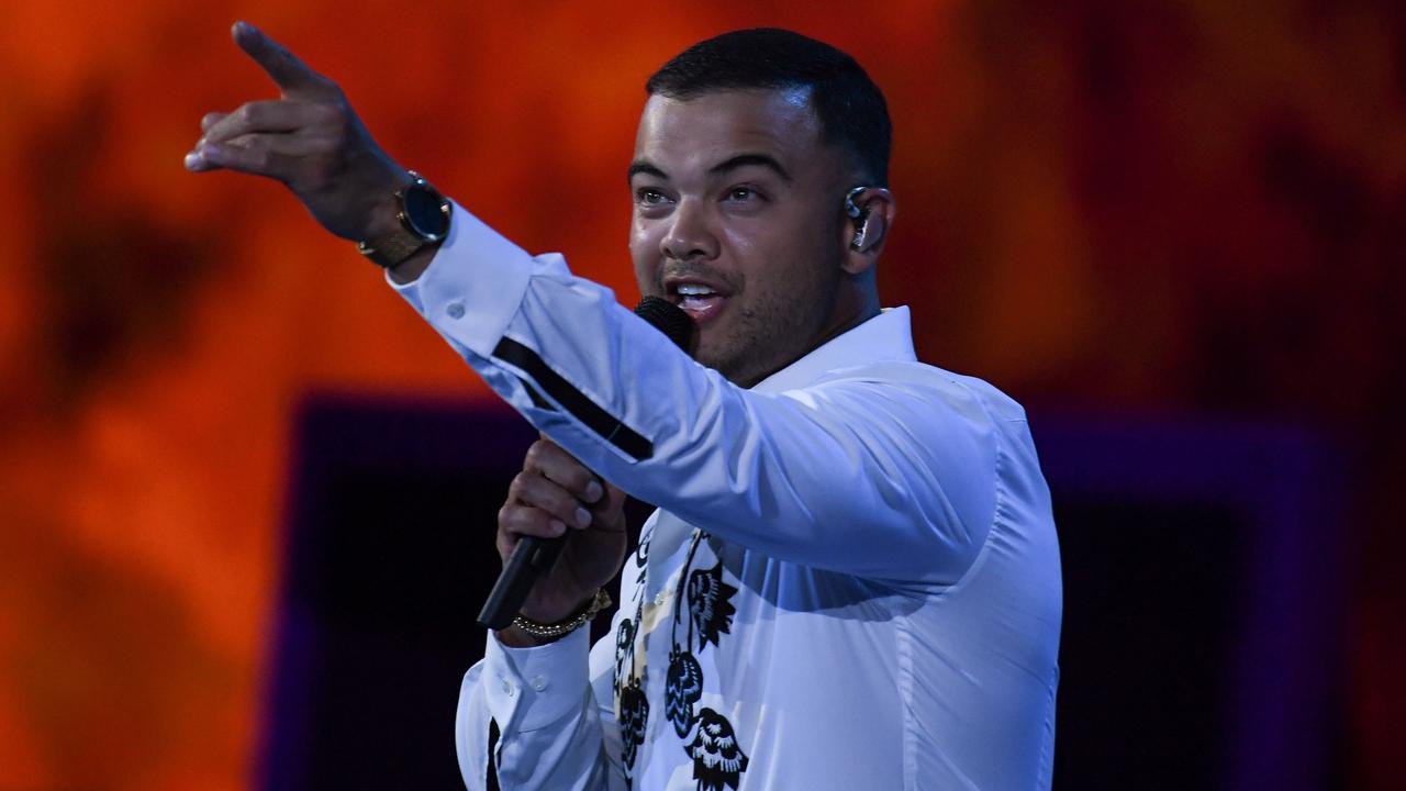 Guy Sebastian didn’t win the Australian Open, but there he was. (Photo by Greg Wood / AFP)