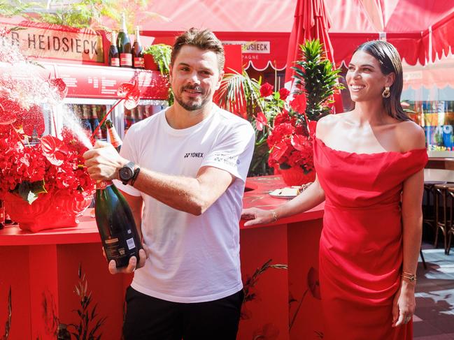 January 12: Stan Wawrinka (SUI) and Ajla Tomljanovic (AUS) at the Piper-Heidsieck activation at RLA Terrace and Garden Square during the 2024 Australian Open on Friday, January 12, 2024. Photo by TENNIS AUSTRALIA / AARON FRANCIS