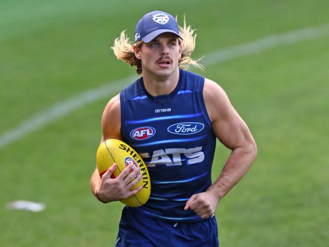 Bailey Smith running laps away from the main group ahead of Geelong Cats training. Picture: Alison Wynd