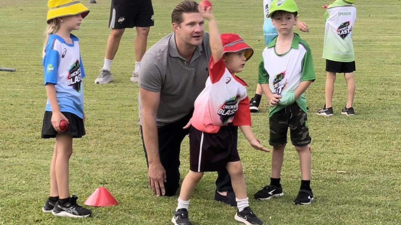 Shane Watson coaching kids on how to bowl. Picture: David Bonaddio