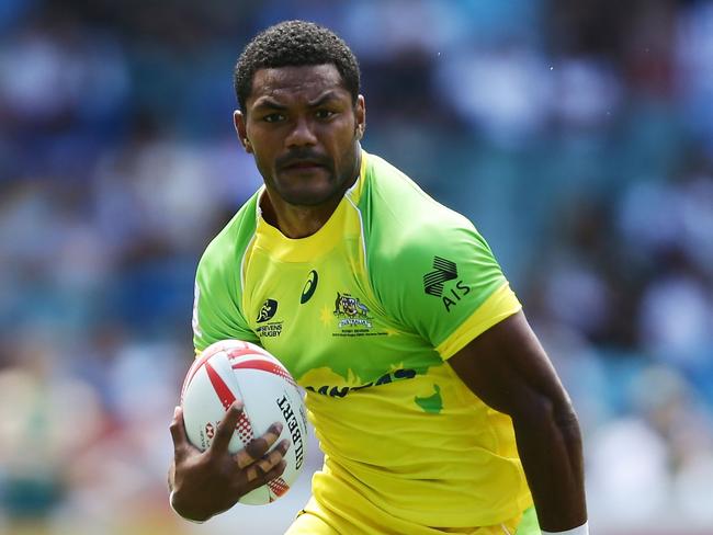 SYDNEY, AUSTRALIA - FEBRUARY 06: Henry Speight of Australia makes a break during the 20146 Sydney Sevens match between Australia and Portugal at Allianz Stadium on February 6, 2016 in Sydney, Australia. (Photo by Matt King/Getty Images)