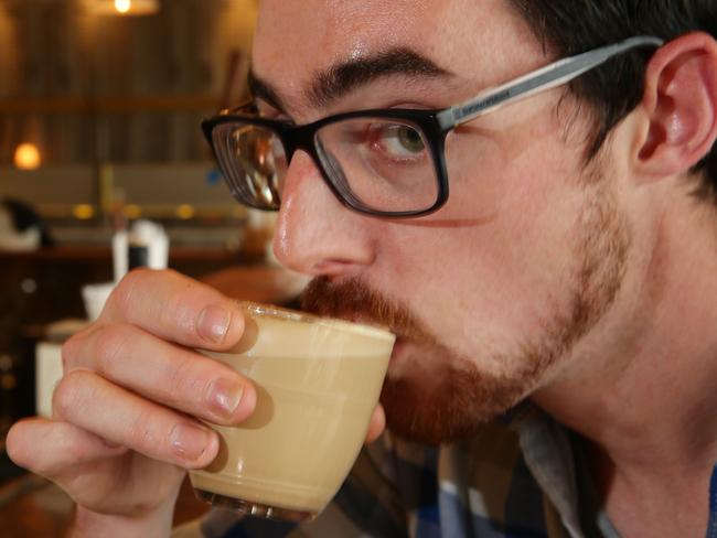 Papi Chulo bar manager Pauric Kennedy sips a Baileys latte.