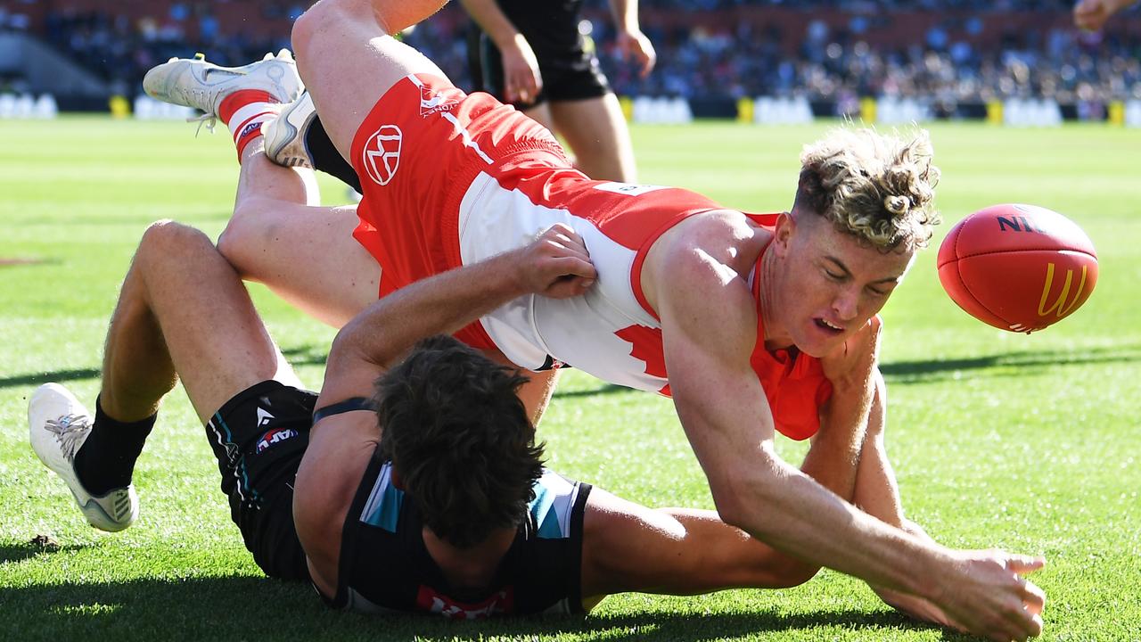 Mitch Georgiades brings down Sydney’s Chad Warner. Picture: Mark Brake/Getty Images