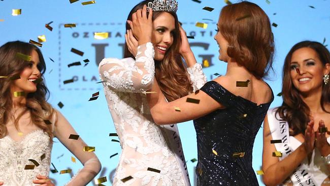 Madeline Cowe from Queensland is crowned Miss World Australia 2016 by Tess Alexander, Miss World Australia 2015 during the final. Picture: Getty