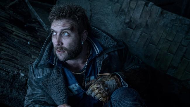 Jai Courtney returns as Captain Boomerang alongside Margot Robbie’s Harley Quinn in The Suicide Squad.