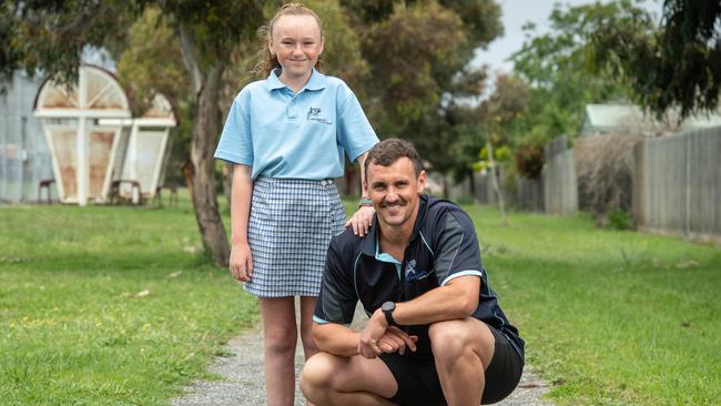 Ned Aulsebrook said students, like 10-year-old Isla, give him high fives as motivation. Picture: Brad Fleet