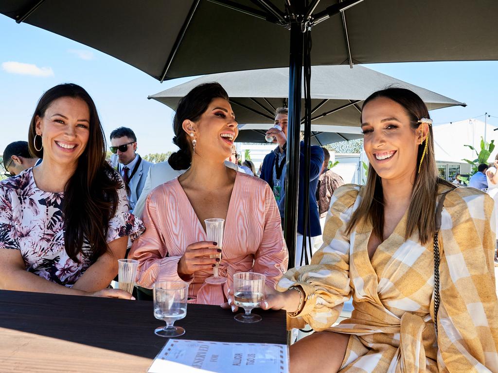 Kelly Schinkel, Allicia Tsolis and Maree Hopgood at the Adelaide Cup at Morphettville Racecourse, Monday, March 8, 2021. Picture: MATT LOXTON