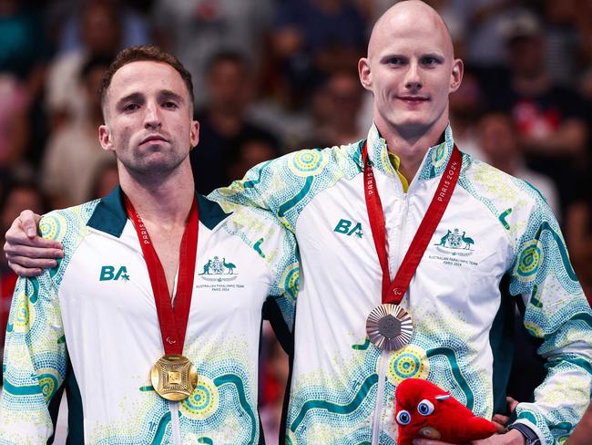 Gold medallist Thomas Gallagher (left) and bronze medallist Rowan Crothers celebrate on the podium. Picture: AFP