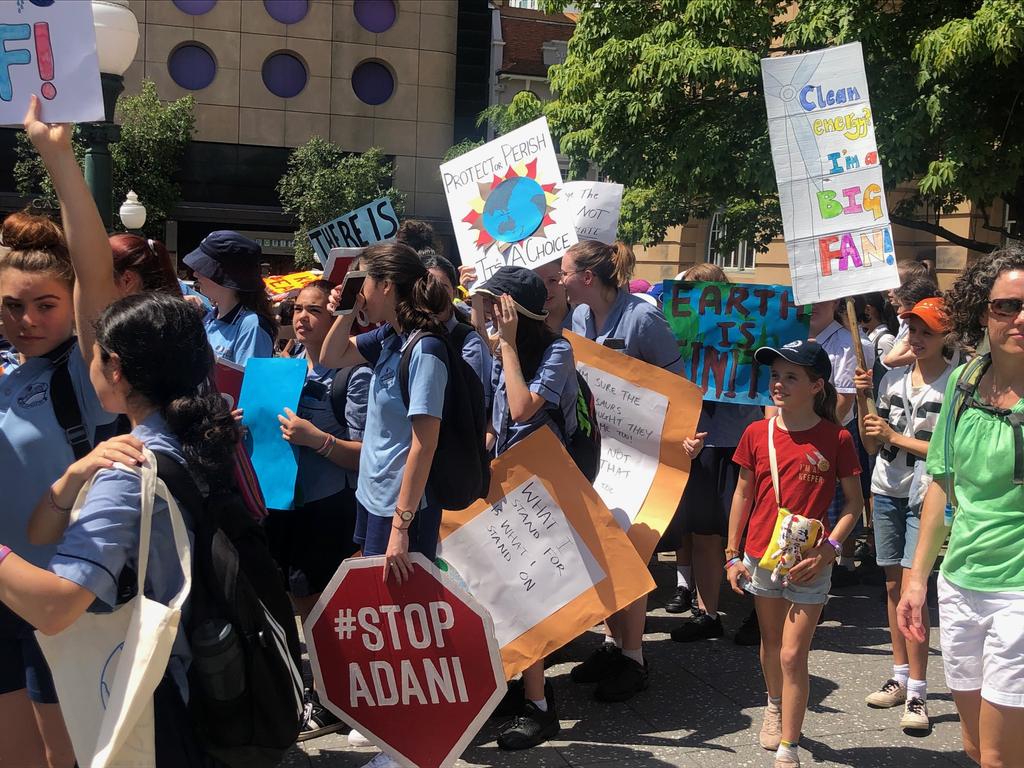 School students rally against climate change in Brisbane CBD. Picture: AAP/Dan Peled