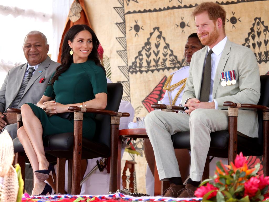 The Duke and Duchess of Sussex Prince Harry and Meghan take part in a traditional fijian ceremony at Nadi Airport in Fiji to . Picture: Nathan Edwards