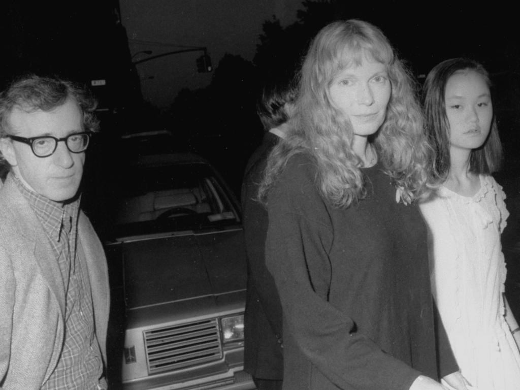 Director Woody Allen with Mia Farrow and her adopted daughter Soon-Yi in the mid 1980s. Picture: Time Life Pictures/DMI/Time Life/Getty Images