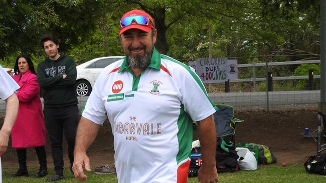 Bradbury Cricket Club legend Mark De Luca walks out to field during his 400th senior game for the club. Picture: Bradbury CC