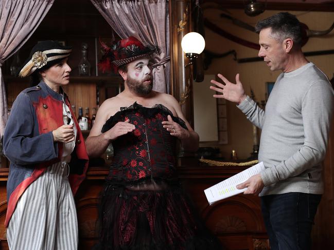 Anna Kidd and Kristian Byrne rehearsing with director Ryk Goddard. Picture: LUKE BOWDEN