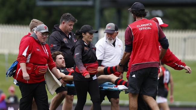 Daniel Withers is taken off the field on a stretcher with a lower leg injury. Picture: Zak Simmonds