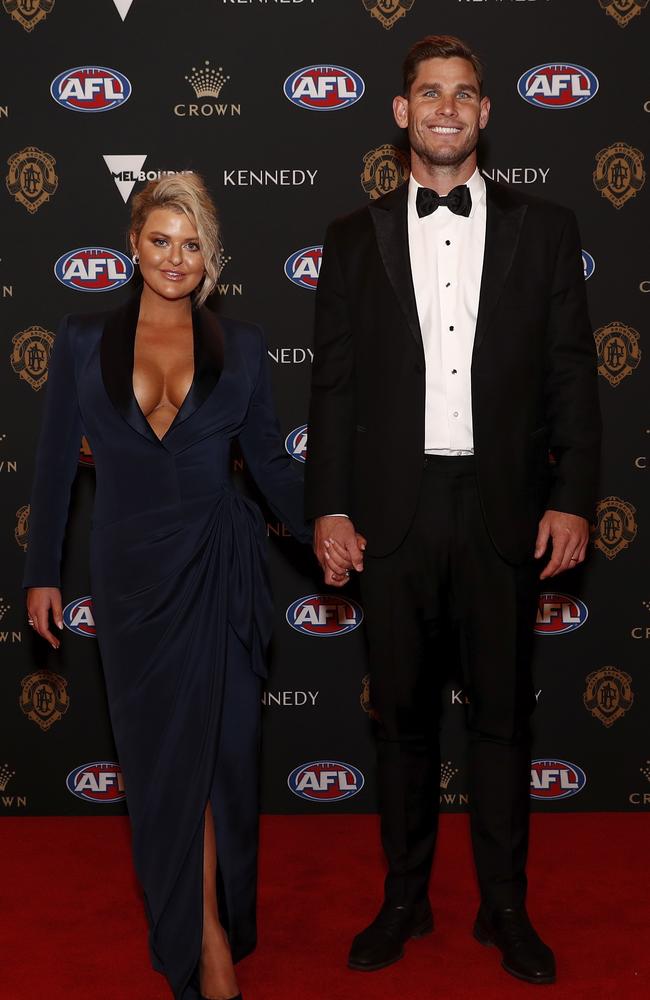 A pre-lockdown Emma and Tom Hawkins in glamour mode at the Brownlow last September. Picture: Getty Images