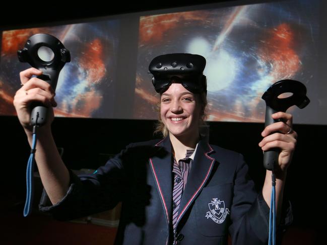 07/11/2017  Year 11 student Samarra Ewing-Crellin from Our Lady of Mercy College, Heidelberg tries  virtual reality and traditional animation 3D content for public education at the new ARC Centre of Excellence for Gravitational Wave Discovery (OzGrav) in MelbournPicture David Geraghty / The Australian.