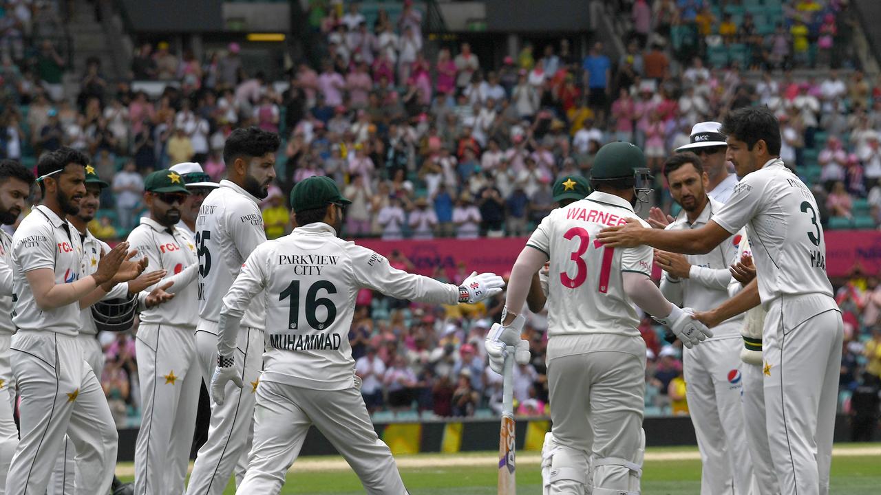 Warner was given a guard of honour by the Pakistan team as he walked out for the last time. Picture: AFP