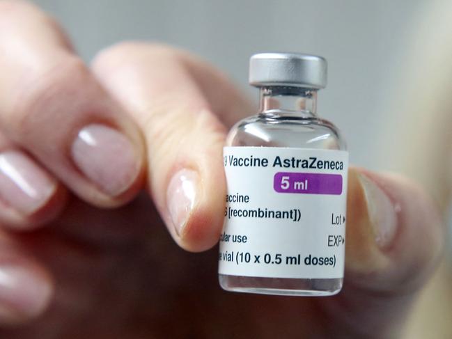 (FILES) In this file photo taken on January 04, 2021 A vial of the AstraZeneca/Oxford Covid-19 vaccine is held at the Pontcae Medical Practice in Merthyr Tydfil in south Wales on January 4, 2021. - Ireland's vaccine taskforce on April 12, 2021 recommended the AstraZeneca/Oxford Covid-19 vaccine be limited to those aged over 60, following European reviews of evidence linking the shot to rare blood clotting events. (Photo by Geoff Caddick / AFP)