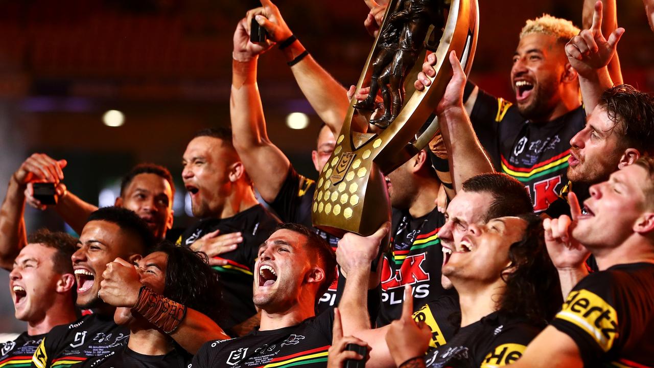 *APAC Sports Pictures of the Week - 2021, October 4* - BRISBANE, AUSTRALIA - OCTOBER 03: The Panthers celebrate with the NRL Premiership Trophy after victory in the 2021 NRL Grand Final match between the Penrith Panthers and the South Sydney Rabbitohs at Suncorp Stadium on October 03, 2021, in Brisbane, Australia. (Photo by Chris Hyde/Getty Images)
