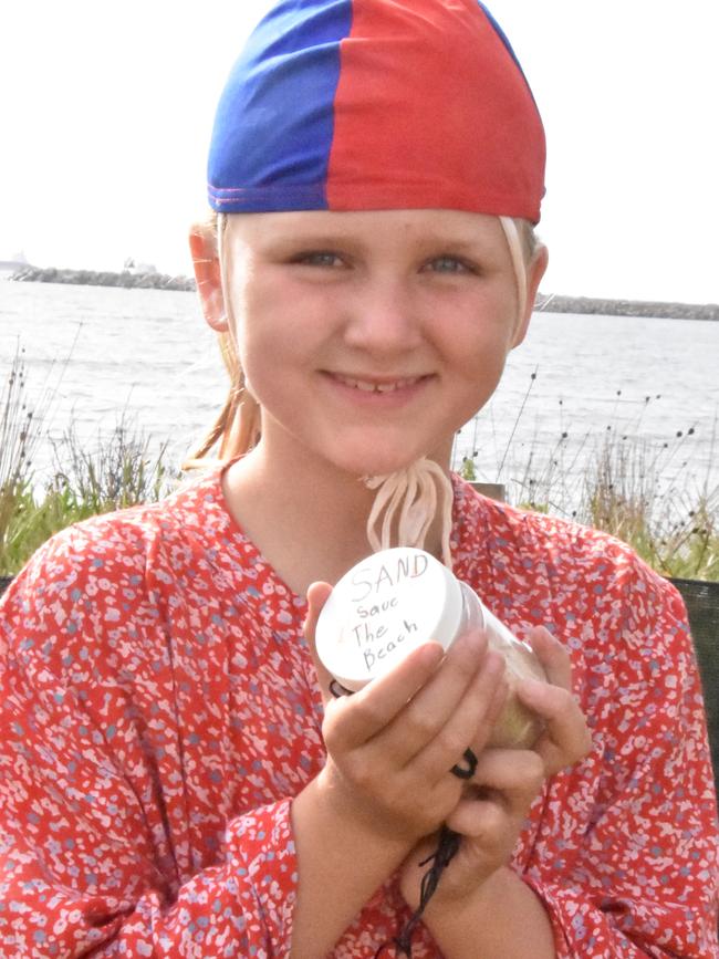 Stockton Nipper surf club member, Asha Maxwell has created a keepsake sand in a bottle. Supplied.