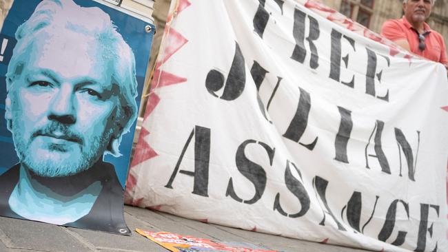 Supporters of WikiLeaks founder Julian Assange attend a protest. Picture: AFP.