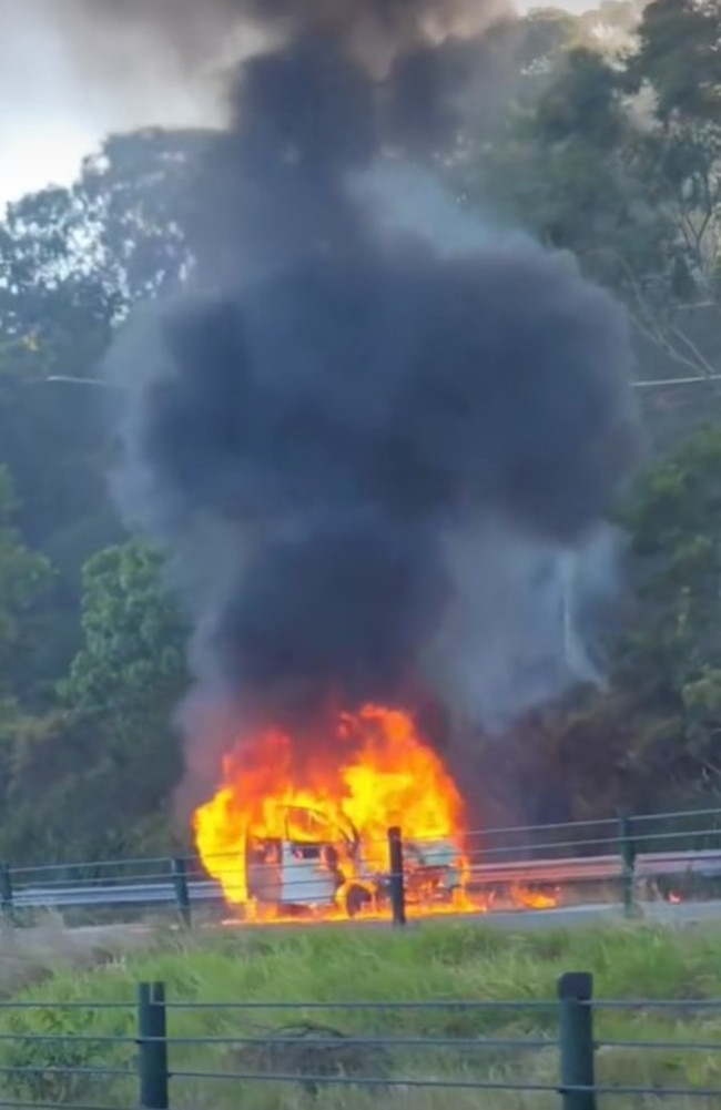 The Queensland Fire Department was called to a car fire on the M1 southbound at Currumbin at 6.24am on Monday. Photo: Jackson Kilpatrick/Facebook