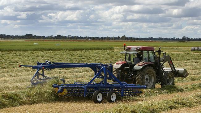 Down market: Much of the hay raked and baled this spring will be exported, but quality will be an issue due to rain damage.