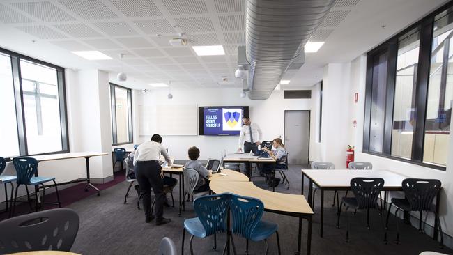 First day at Fortitude Valley State Secondary College. 585 St Paul's Terrace and Brookes St, Fortitude Valley, Brisbane, 28th of January 2020. (AAP Image/Attila Csaszar)