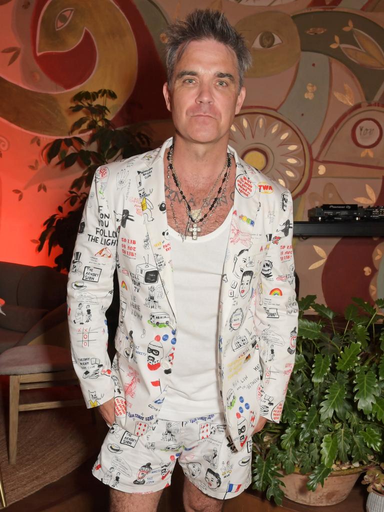 Robbie Williams attends the TCA Ibizan Art Gala last month in aid of Teen Cancer America.