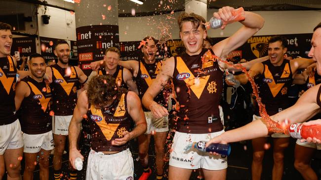 First-year Hawks Nick Watson (left) and Calsher Dear celebrated their maiden win in the seven-point victory over the Western Bulldogs on Sunday. Picture: Dylan Burns / Getty Images