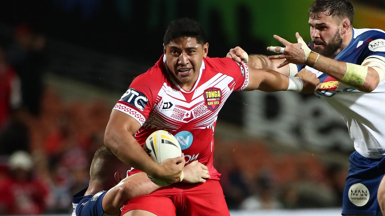 Jason Taumalolo captain of Tonga heads for the try line
