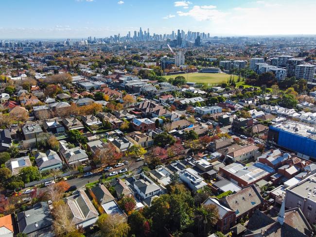 Aerial view of houses in Armadale, looking towards the Melbourne city skyline.