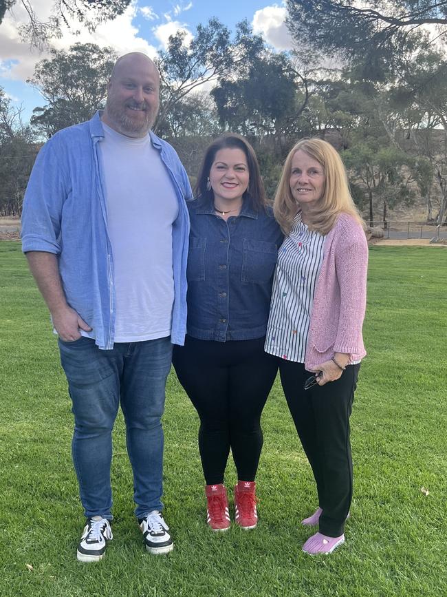 Chase Reid (left) with his wife Vienna Possemato (middle) and mother Gwen Reid (right) who visited from Canada two weeks before the crash. Picture: Supplied