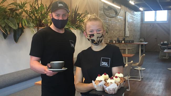 Higher Society owner Rhys Jeffrey and staffer Alex Murphy welcoming patrons in Ballarat. Picture: Tess Ikonomou