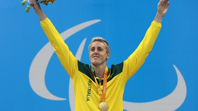 RIO DE JANEIRO, BRAZIL - SEPTEMBER 09: Gold medalist Brenden Hall of Australia celebrates on the podium at the medal ceremony Men's 400m Freestyle - S9 on day 2 of the Rio 2016 Paralympic Games at the Olympic Aquatics Stadium on September 9, 2016 in Rio de Janeiro, Brazil. (Photo by Friedemann Vogel/Getty Images)