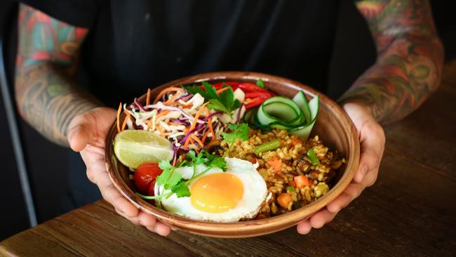 Laneway Chef Dika Krishna with his Laksa flavoured rice bowl. The Darwin Laksa Festival has been a smart initiative to draw wet-season tourists. Picture: Glenn Campbell