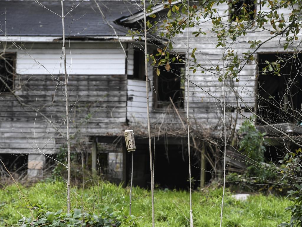 A dilapidated home can be seen from neighbouring Old Plateau Cemetery, the final resting place for many who spent their lives in Africatown, near Mobile, Albama. Picture; AP