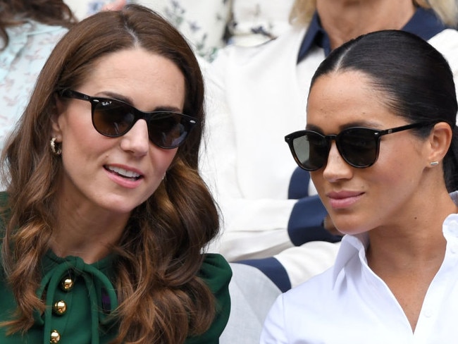 LONDON, ENGLAND - JULY 13: Catherine, Duchess of Cambridge and Meghan, Duchess of Sussex in the Royal Box on Centre Court during day twelve of the Wimbledon Tennis Championships at All England Lawn Tennis and Croquet Club on July 13, 2019 in London, England. (Photo by Karwai Tang/Getty Images)