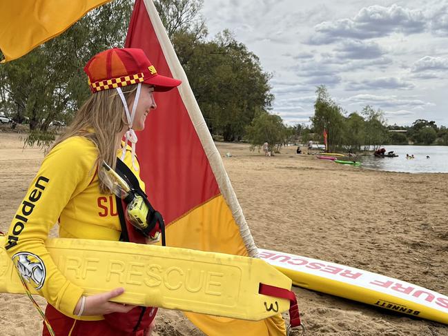 Lilly Adams keeps an eye on people swimming at Apex Beach.