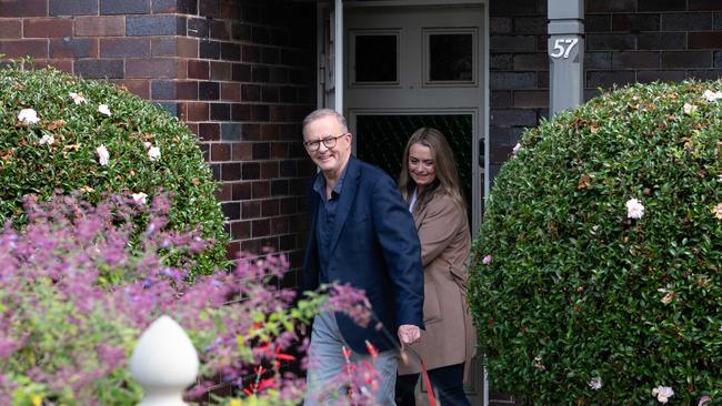 Prime Minister Anthony Albanese and his partner Jodie Haydon walk out of his Marrickville home on Sunday morning. Picture: NCA NewsWire / Flavio Brancaleone