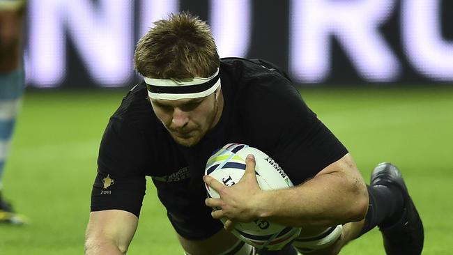 New Zealand's flanker Sam Cane scores a try during a Pool C match of the 2015 Rugby World Cup between New Zealand and Argentina at Wembley stadium, north London on September 20, 2015. AFP PHOTO / GABRIEL BOUYS RESTRICTED TO EDITORIAL USE, NO USE IN LIVE MATCH TRACKING SERVICES, TO BE USED AS NON-SEQUENTIAL STILLS