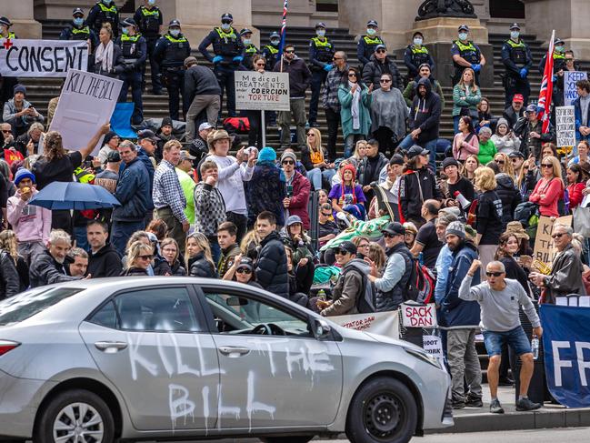 Protesters gather on the steps of Victorian Parliament to protest the new pandemic bill in response to the Covid 19 pandemic. Picture: Jason Edwards