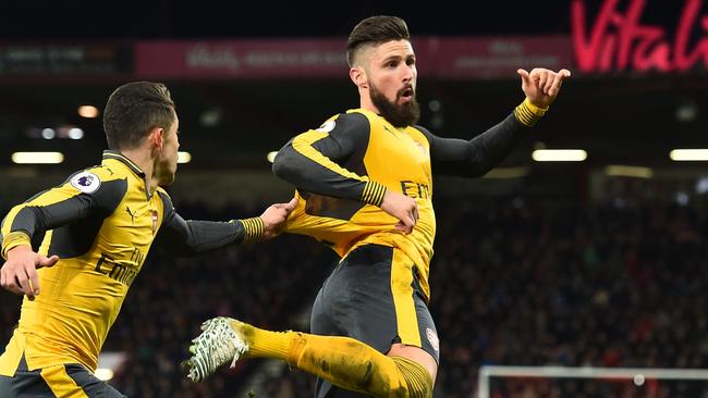 Arsenal's French striker Olivier Giroud celebrates after scoring.