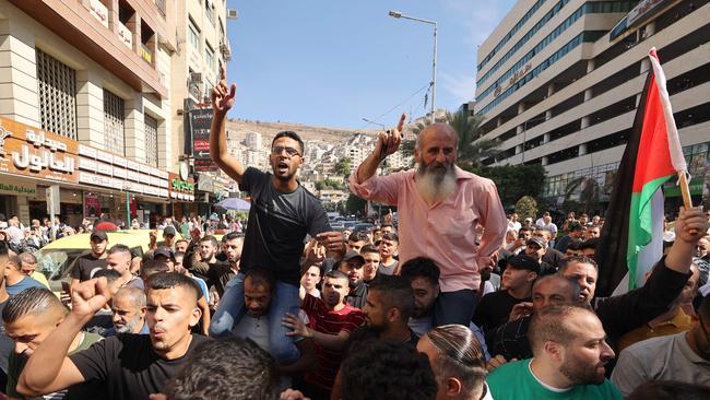 Palestinians in the West Bank city of Nablus celebrate. Picture: AFP