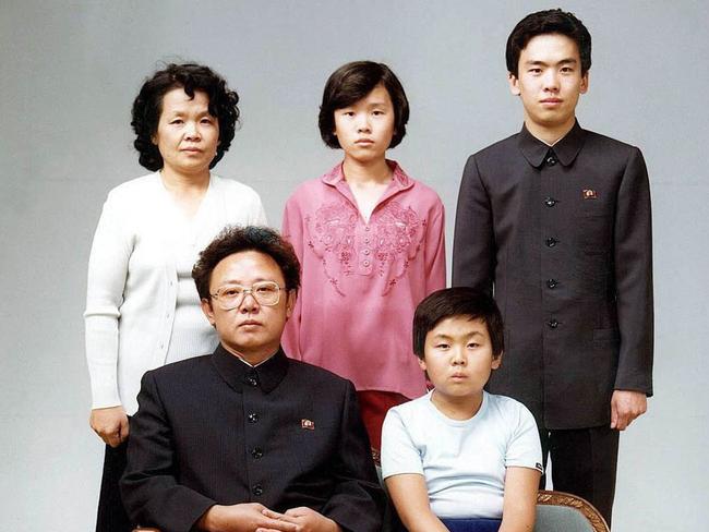 This photo taken in 1981 shows North Korean leader Kim Jong-il sitting with his son, Jong-nam (sitting-right), Kim’s sister-in-law Sung Hye-Rang (top left), Sung’s daughter Lee Nam-Ok (centre top) and son Lee Il-Nam (top right).