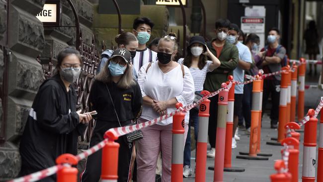 People queuing for Covid tests at Melbourne Town Hall last week. Picture: Andrew Henshaw